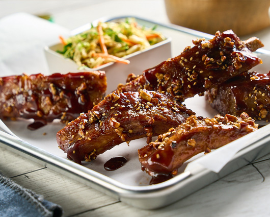 Pecan Encrusted Sticky Ribs with Ginger Slaw